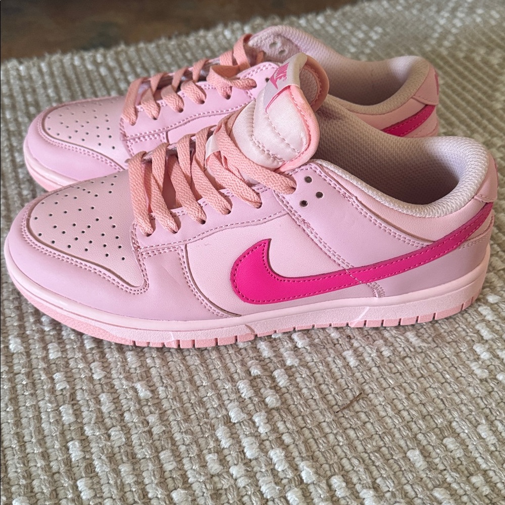 Nike Light Pink Sneakers with Vibrant Swoosh